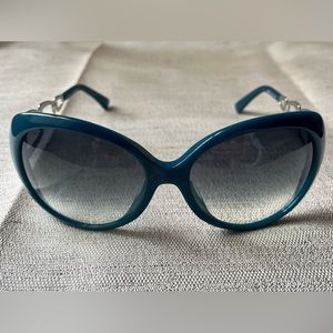 Emilio Pucci sunglasses. Large, round.